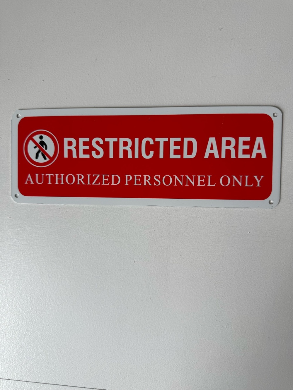Red "Restricted Area - Authorized Personnel Only" Wall Sign